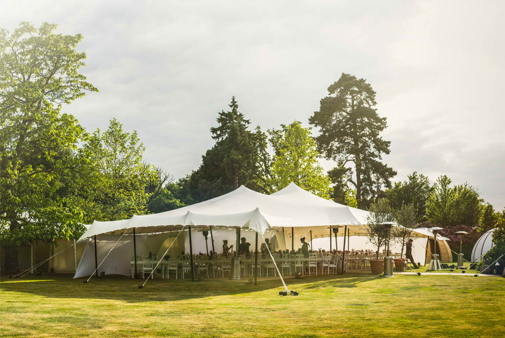 white stretch tent in garden